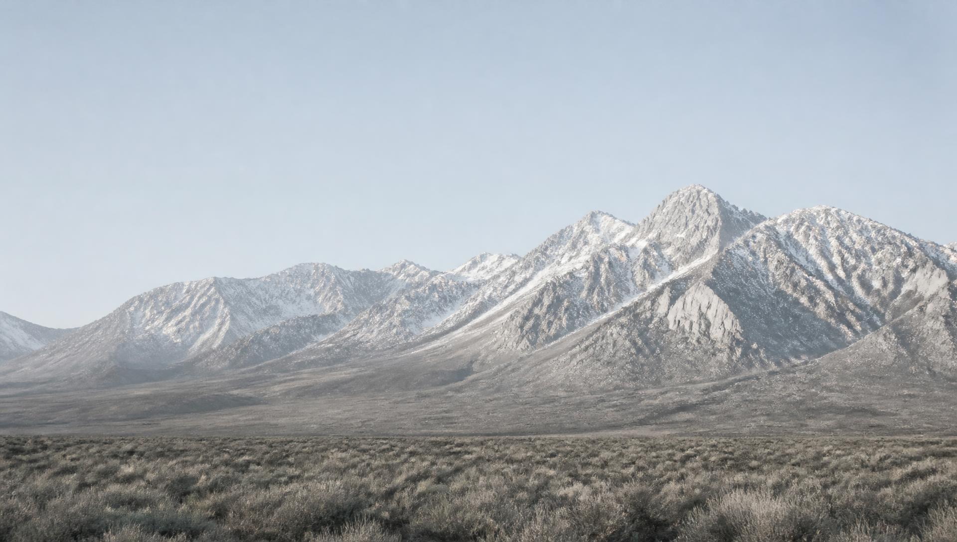 Snow-dusted Sierra Nevada peaks above the sagebrush floor of the Owens Valley
